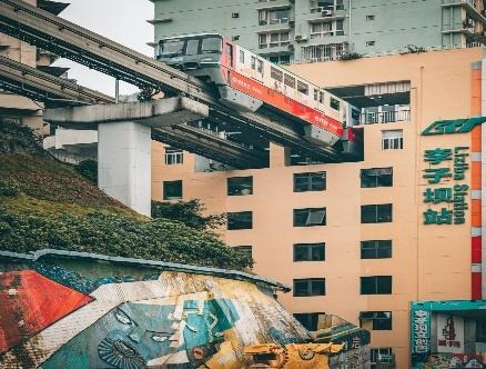 A train going over a building
AI-generated content may be incorrect.